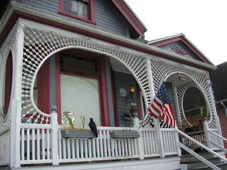 Burgundy house with flag